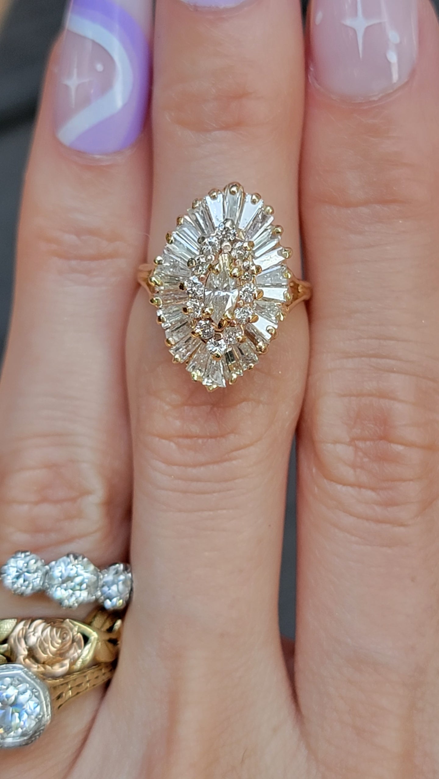 Introducing our exquisite Yellow Gold and Diamond Ballerina Ring. This stunning piece combines timeless elegance with exceptional craftsmanship, making it the perfect accessory to float through any occasion effortlessly. Let its 39 sparkling diamonds and brilliance enhance your style and leave a lasting impression.