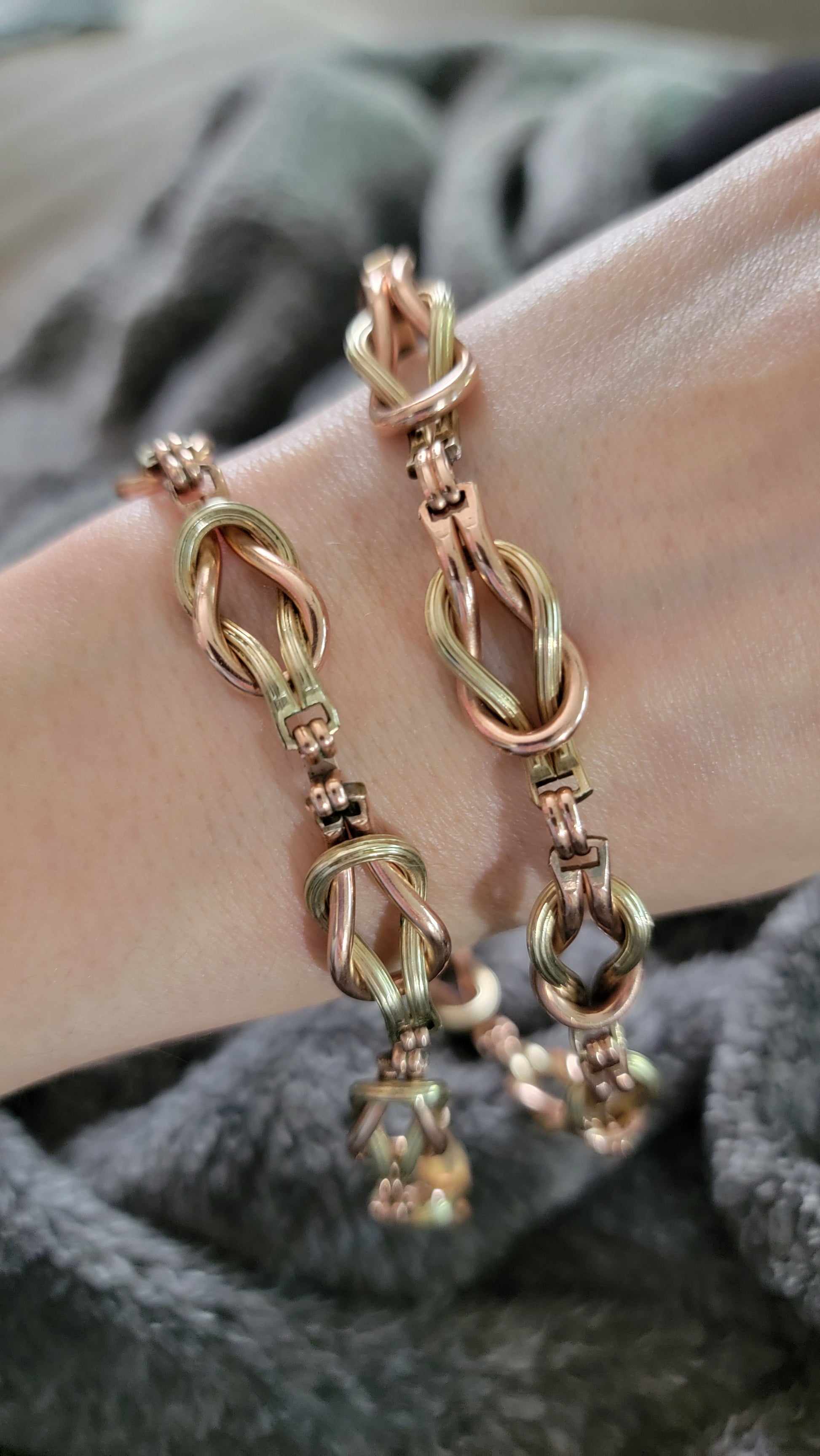 Your beautiful necklace is a 12k gold filled piece. It has green, rose, and yellow gold. The links are both textured/polished finish.  The entire set can be connected or worn as separate pieces. 