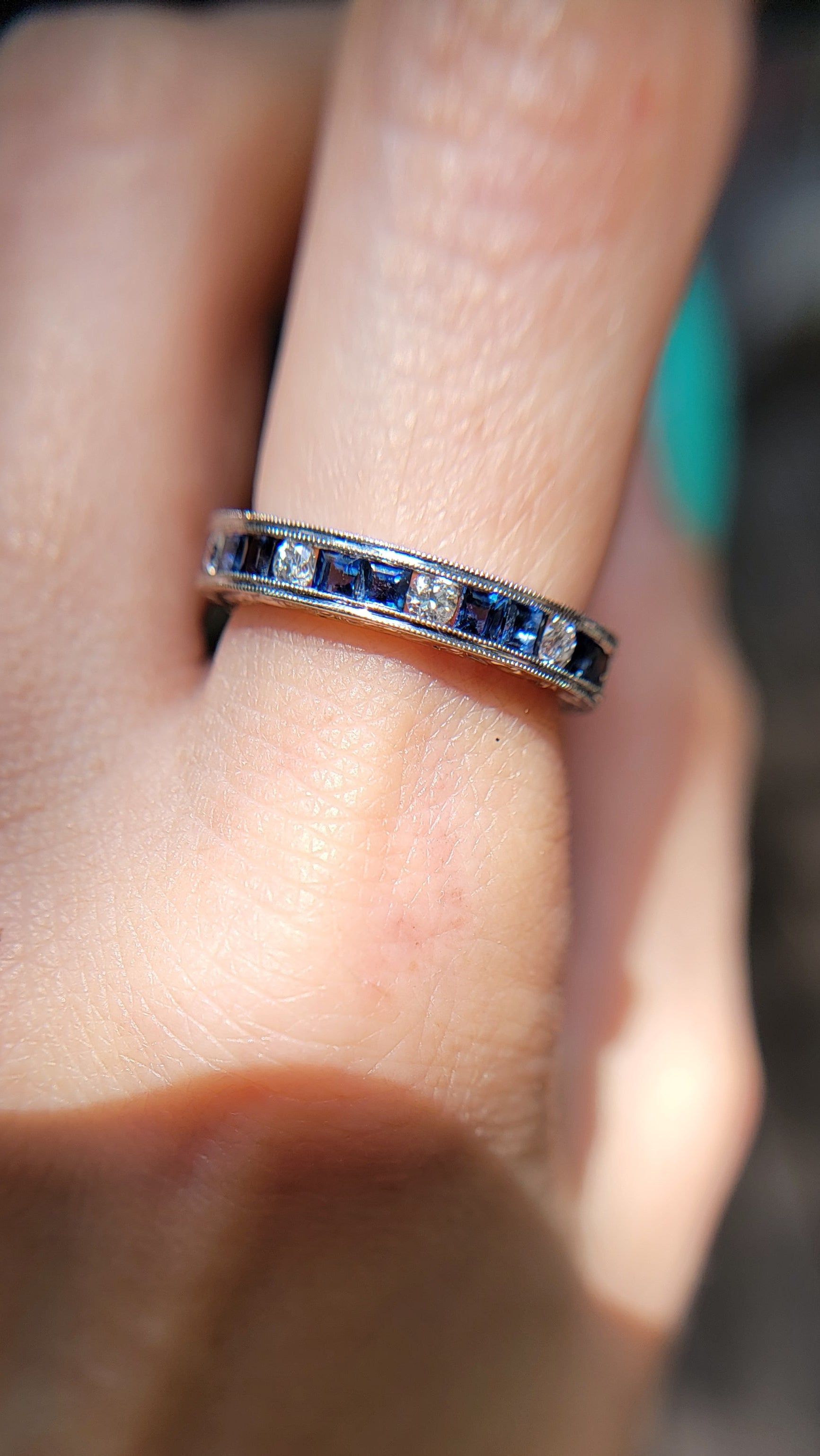 Your beautiful eternity band is crafted in 18k gold. She features approx 1.26ct blue sapphire and .50ct of stunning diamonds.  She weighs approx. 3.5.