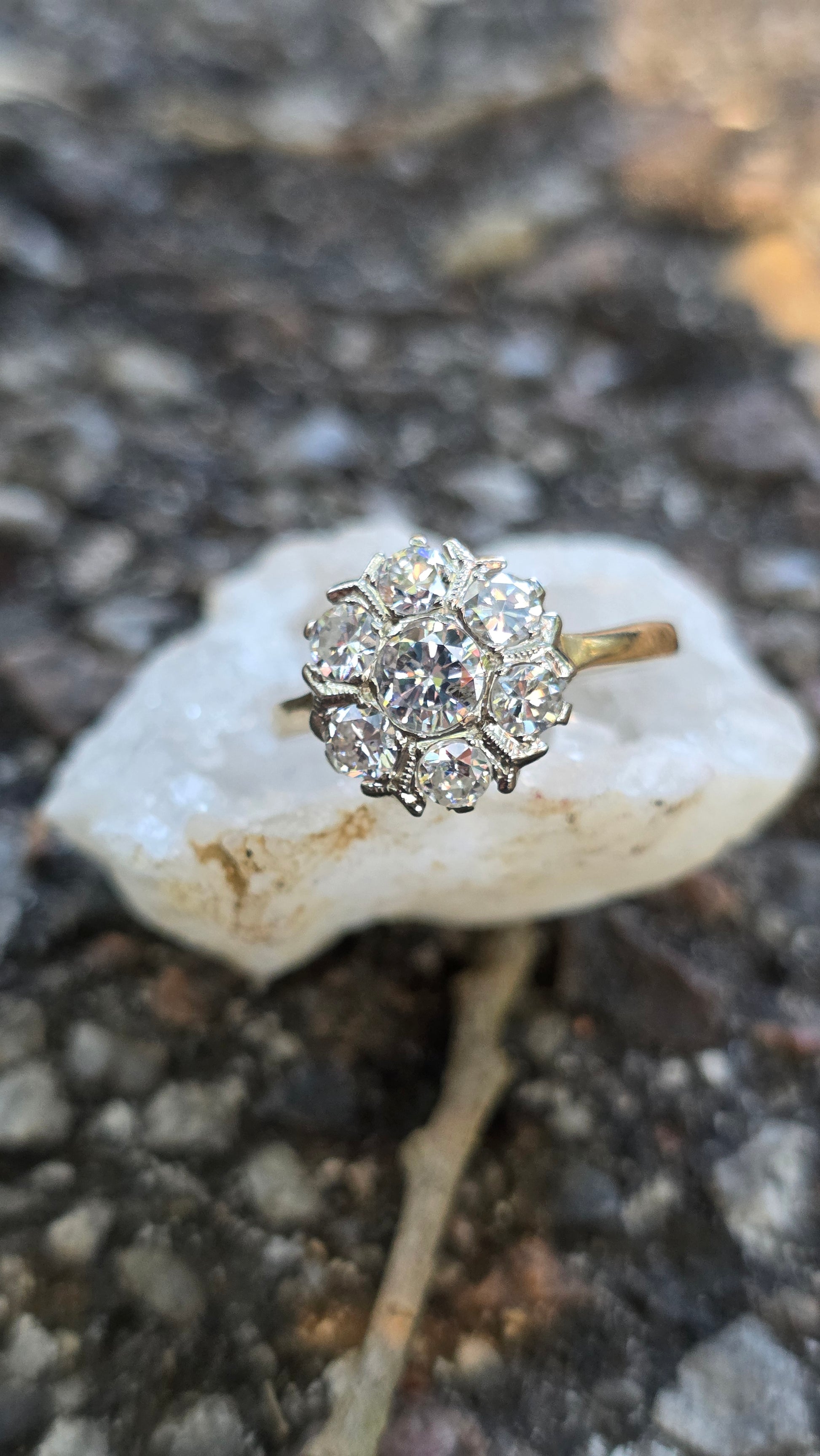 Diamond ring on a textured stone surface