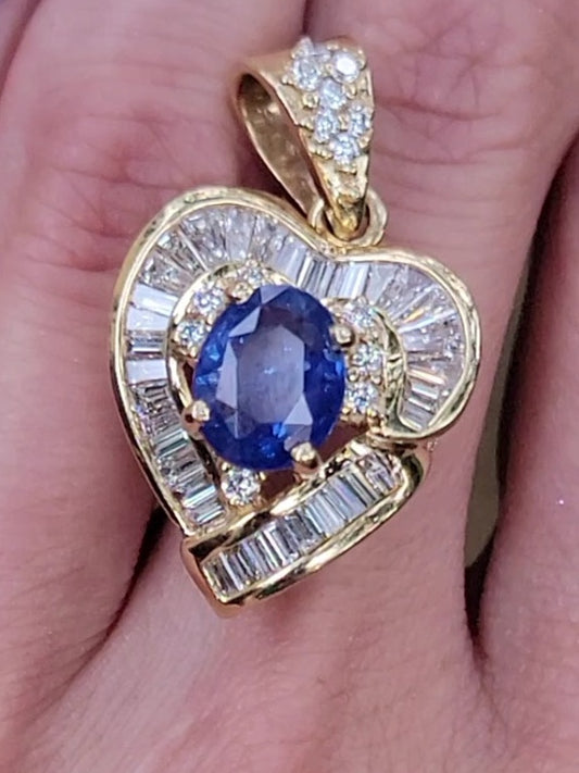 Introducing our Queen of the Ballerinas, this stunning piece has appox. 3.45ctw of the most exquisite diamonds we've seen.  The deep blue of the massive natural treated sapphire will leave you speechless. If you let this ballerina style pendant take the stage, anticipate a standing ovation from any jewelry aficionado. 