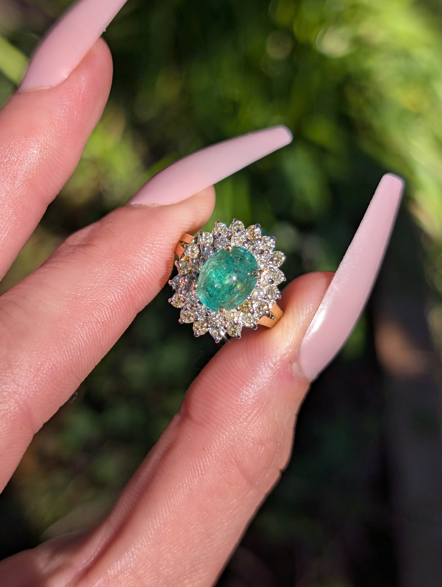 14k Emerald and Diamond Halo Ring